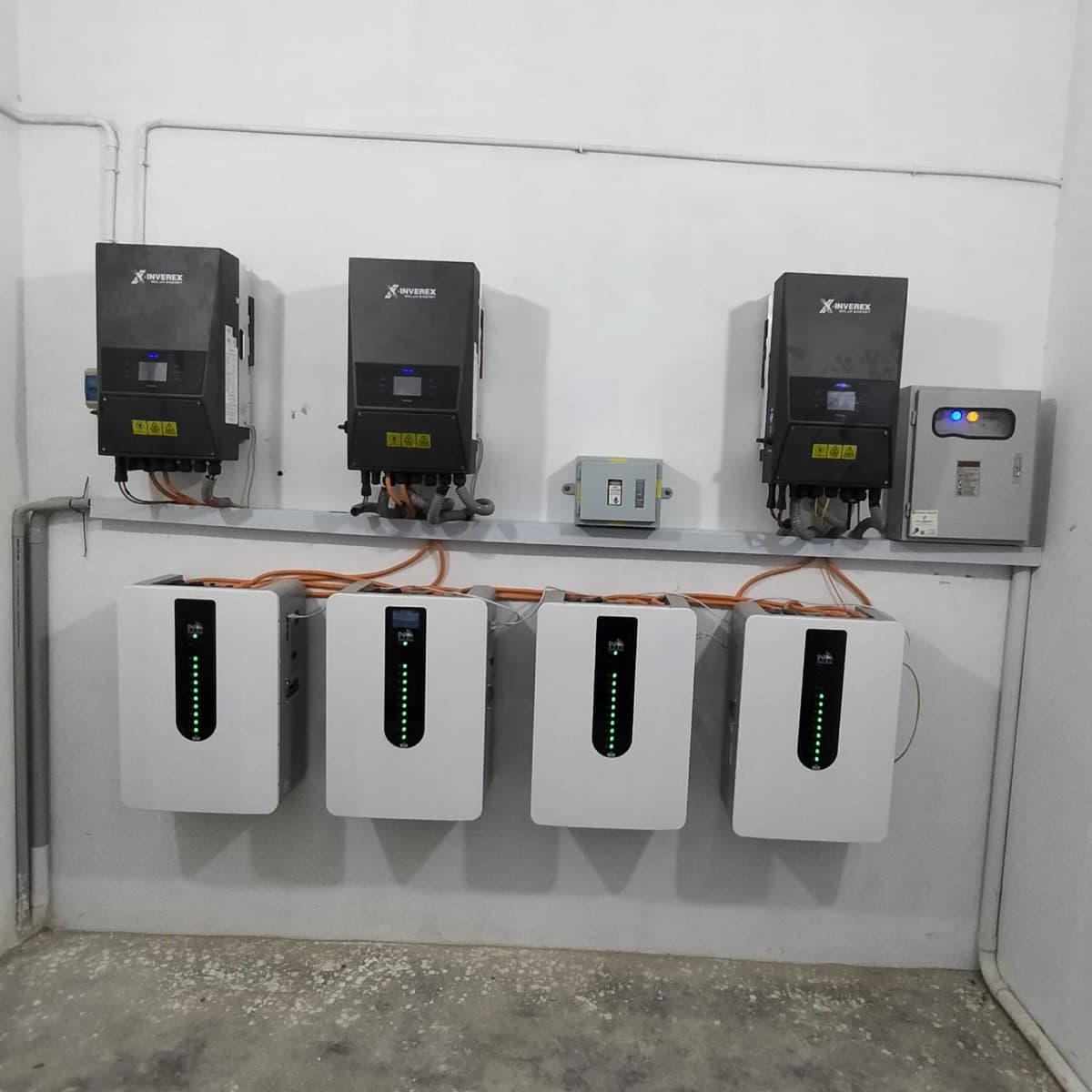 Inverters and lithium battery storage at a farmhouse in Gadap Town