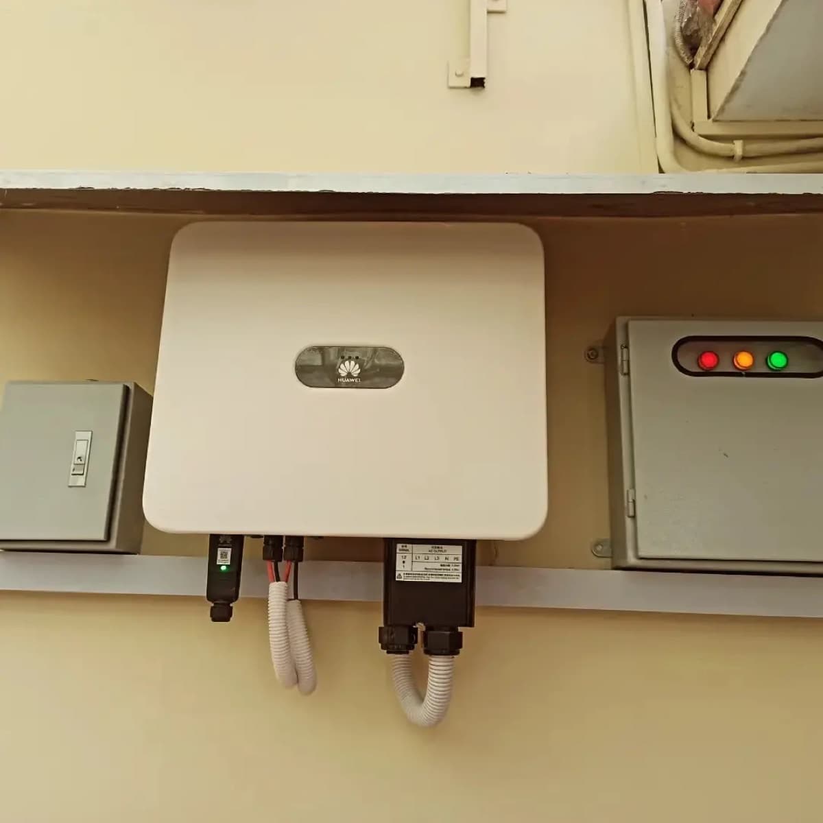Huawei 20 kW on-grid inverter between its protection boxes in Gulshan-e-Iqbal